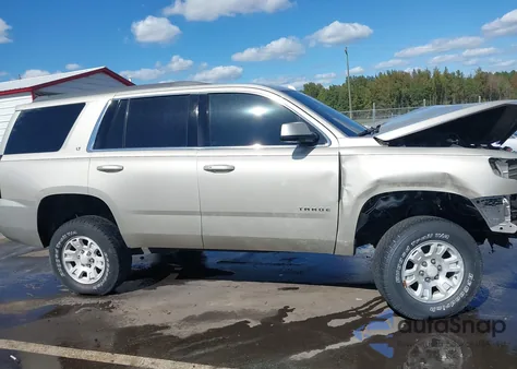 2015 Chevrolet Tahoe Lt z USA, uszkodzony, nr VIN 1GNSKBKC4FR641220